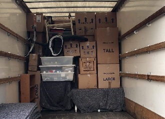 So Storage Removal service - packing boxes into a van